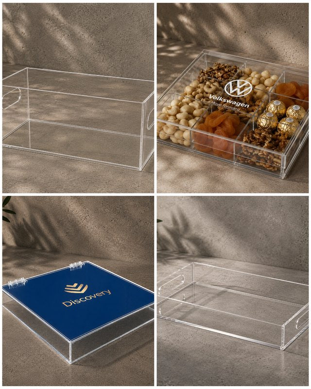 Custom perspex boxes and trays, including branded pieces for Volkswagen and Discovery